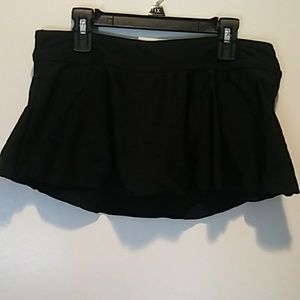 black skirted swim shorts size medium